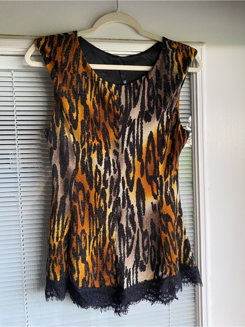 Love culture Sleeveless Animal Print Sparkle Top in Brown and Black